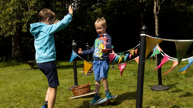 Children on an activity trail in the gardens at Mottisfont, Hampshire